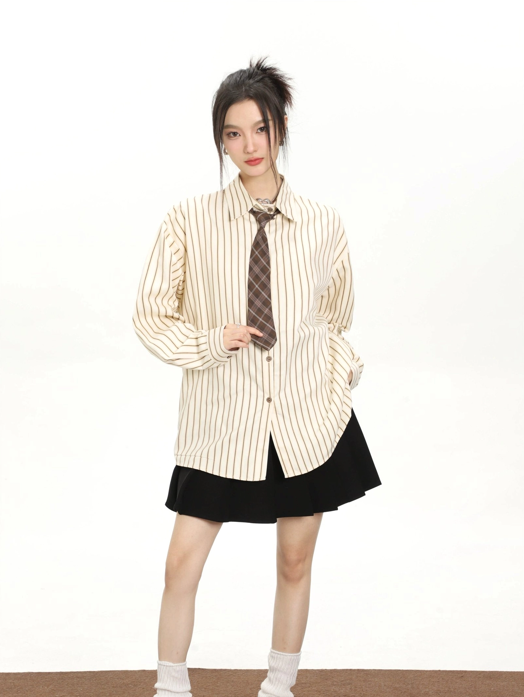 Vintage striped oversized women's shirt inspired by Korean streetwear and relaxed preppy fashion styling