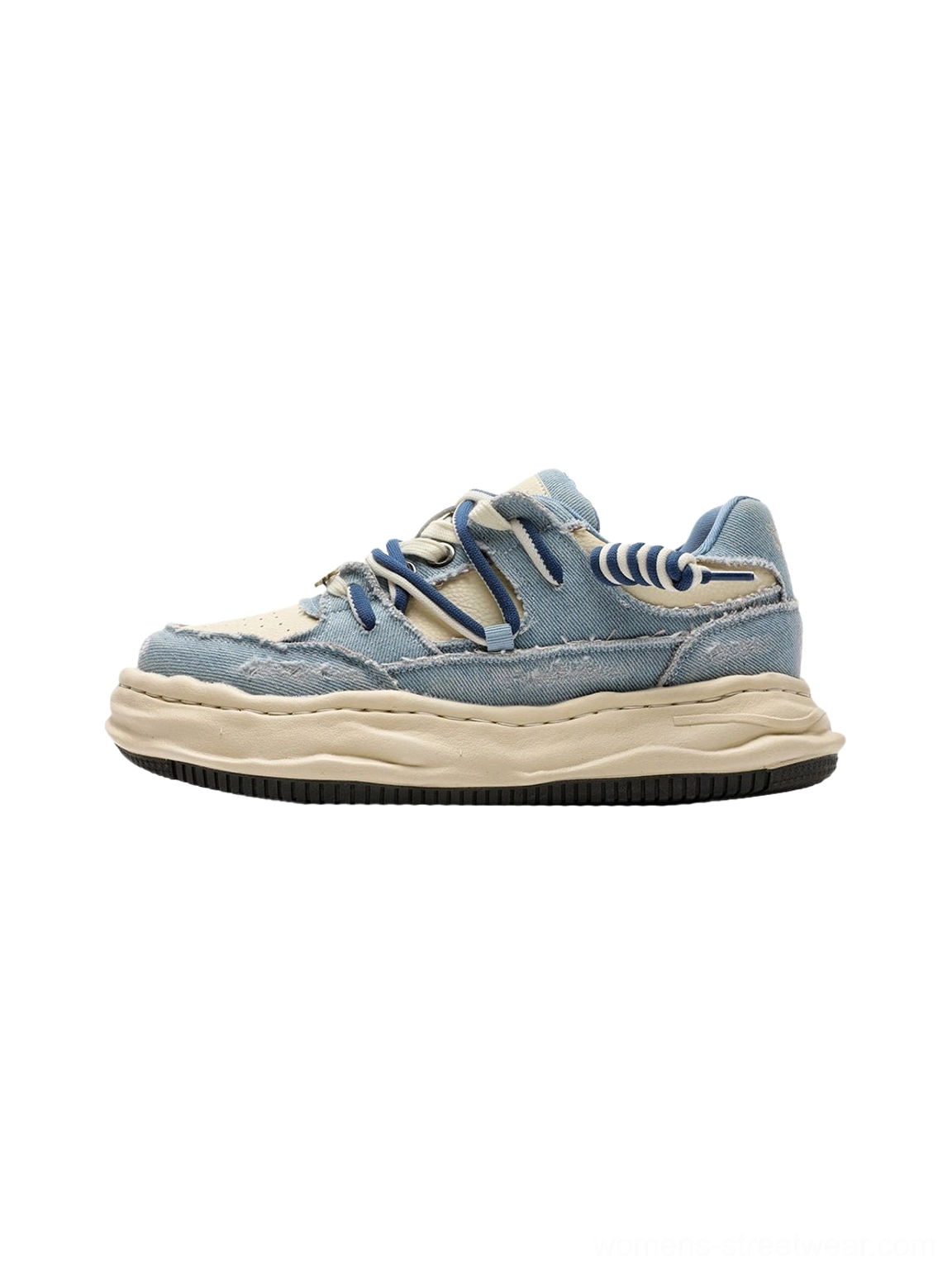 Vintage wash denim platform sneakers with distressed texture styled as a bold everyday streetwear footwear option