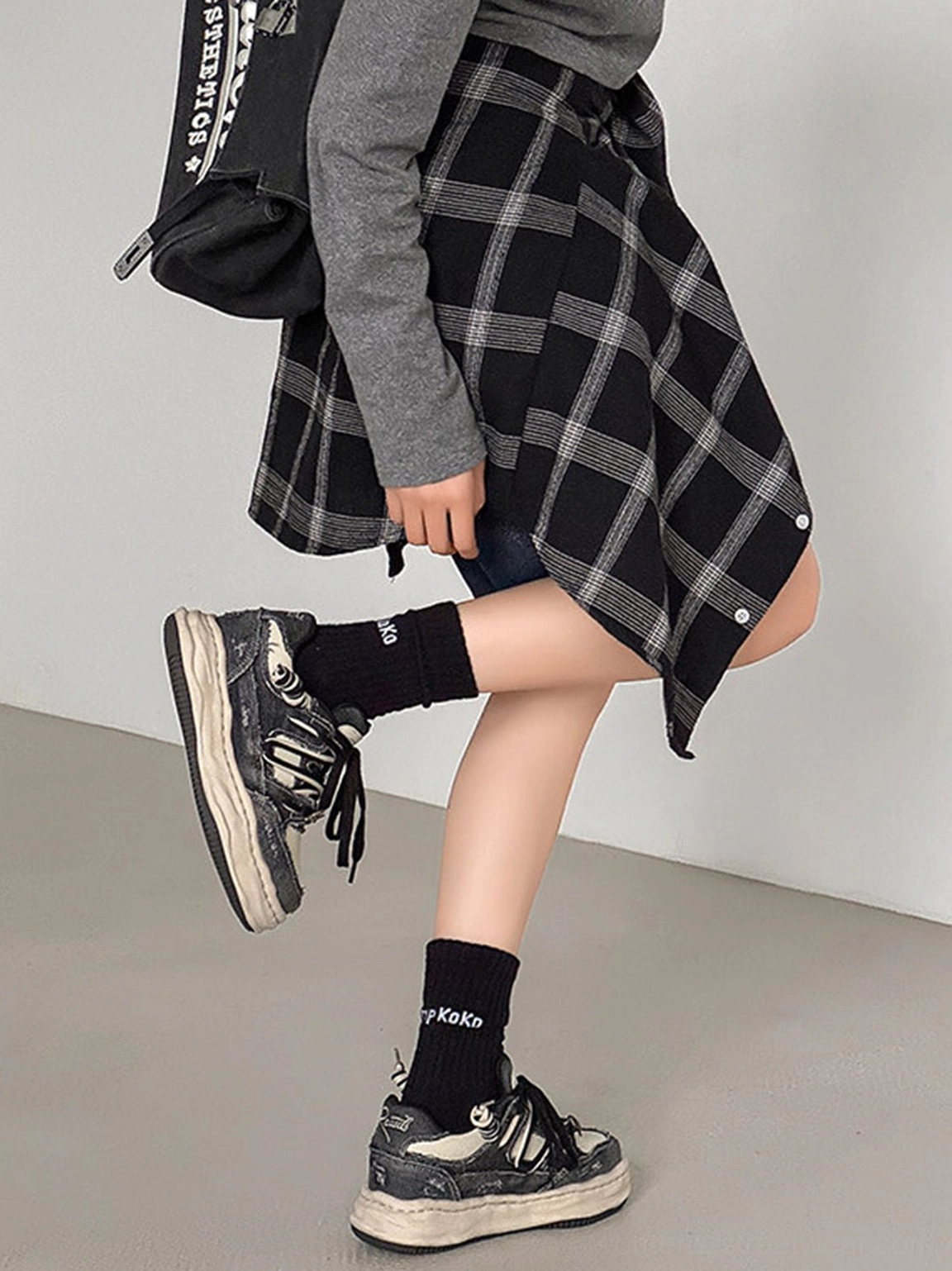 Vintage wash denim platform sneakers with a substantial cream sole and statement streetwear silhouette