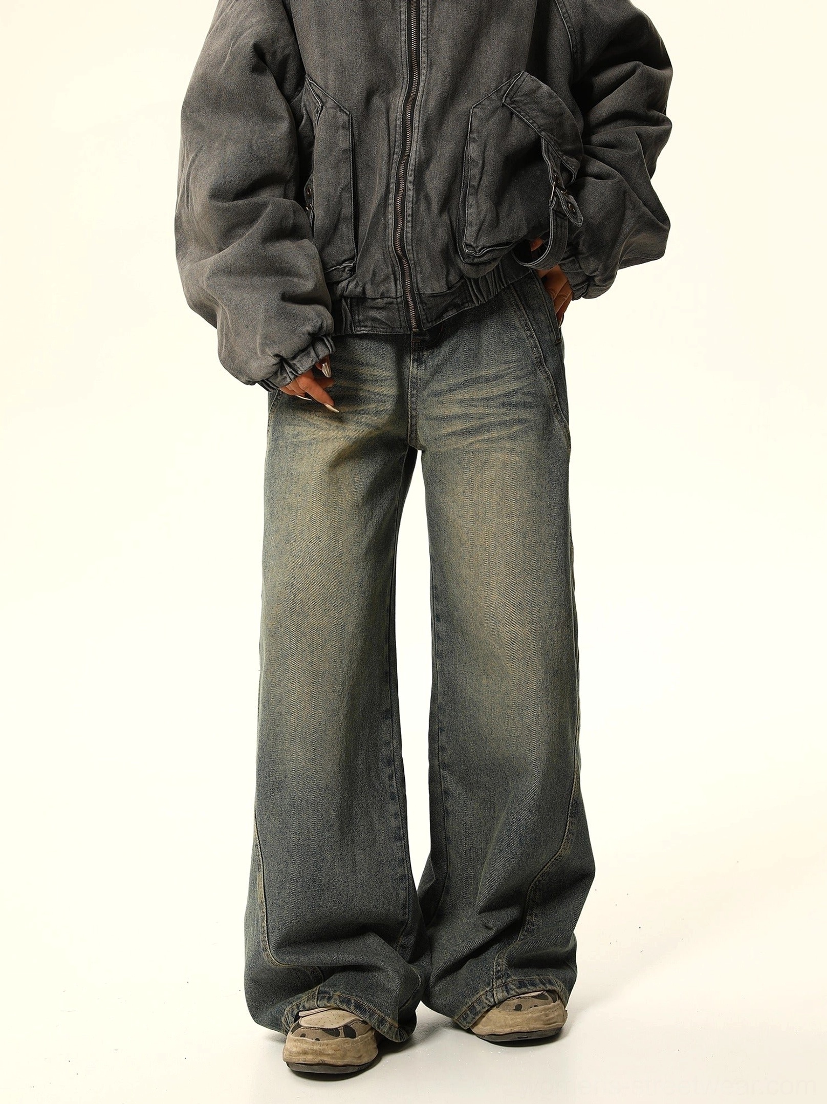 Front view of faded denim jacket styling with blue vintage wash wide-leg carpenter jeans in a Seoul streetwear outfit