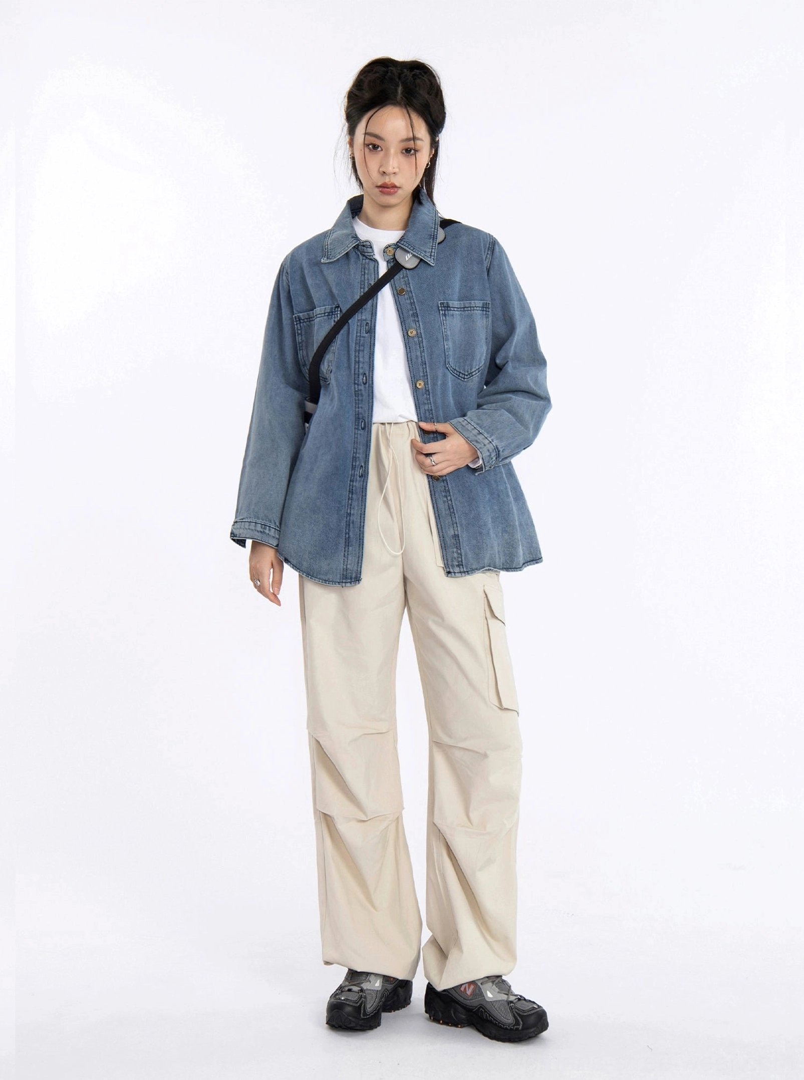 Vintage washed dark blue denim shirt jacket for women with relaxed streetwear styling and classic button-front details