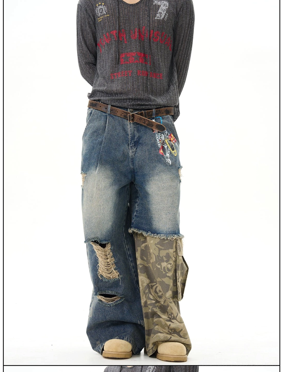Front view of vintage washed distressed patchwork wide-leg jeans with camo cargo panels, ripped accents, and decorative pocket details for an edgy streetwear outfit