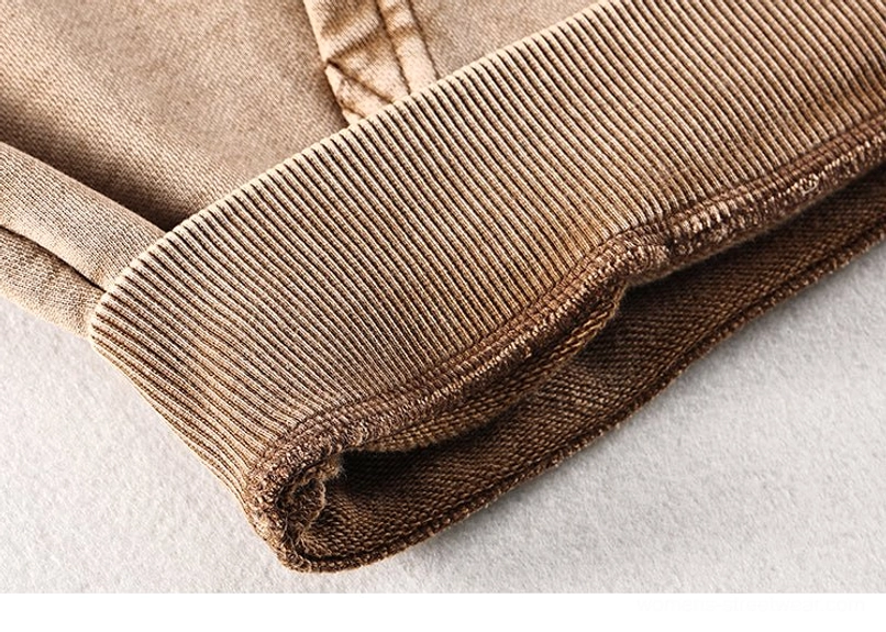 Vintage washed oversized hoodie with contrast stitching and relaxed drop-shoulder streetwear silhouette detail view