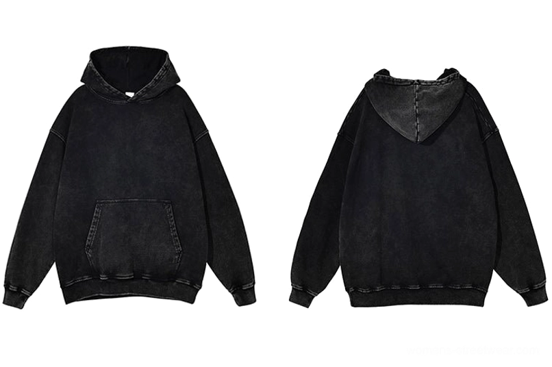 Vintage washed oversized hoodie showcasing the relaxed back silhouette and ribbed hem streetwear design