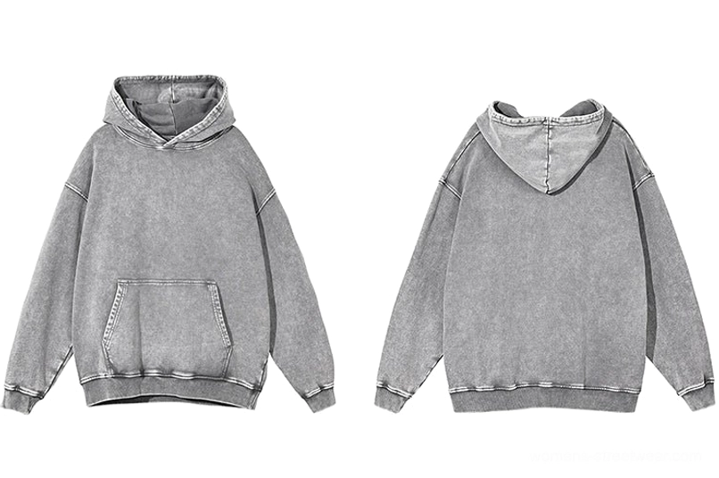 Vintage washed oversized hoodie with a roomy kangaroo pocket and relaxed unisex-inspired streetwear shape