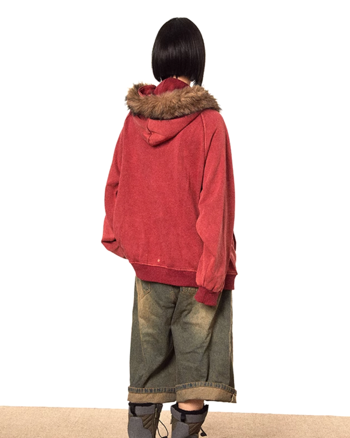 Back view of vintage washed red oversized hooded zip-up jacket showing ribbed hem and brown faux fur hood trim