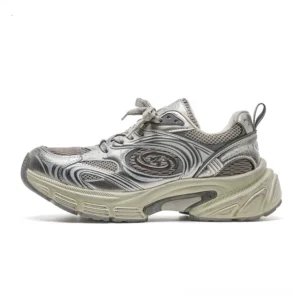 Vortex Orbit chunky retro running sneakers in metallic silver with black swirl overlays and cream platform sole left side view