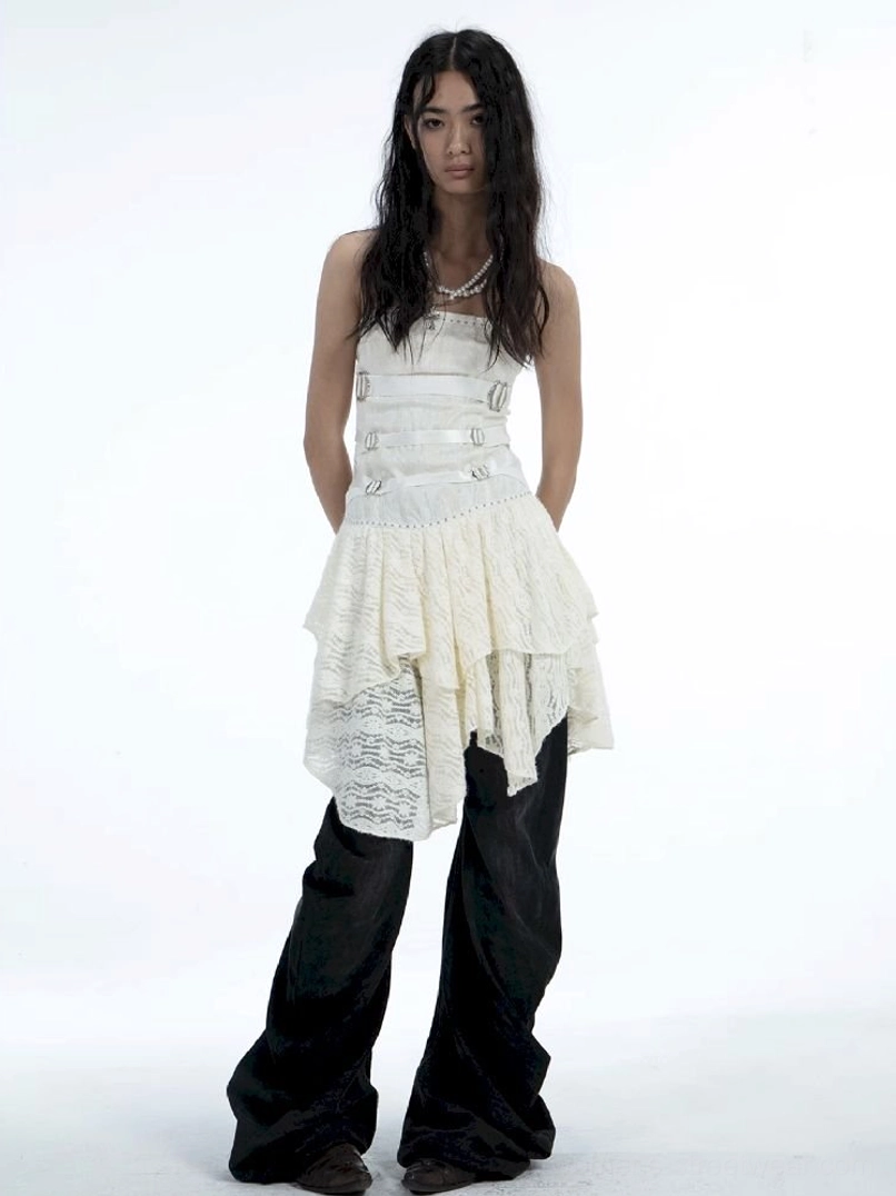 Women’s washed black low-rise flare jeans with silver button fly and wide-leg Y2K silhouette