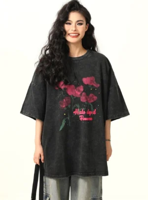 Washed black poppy floral oversized vintage streetwear T-shirt front view on female model