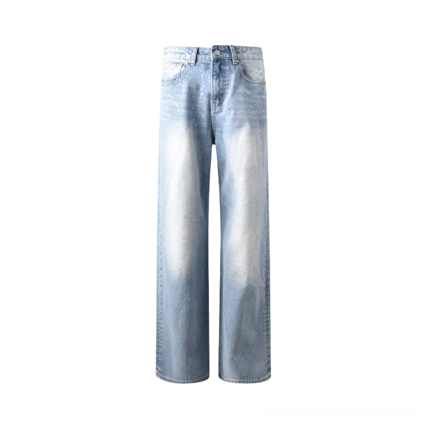 Washed blue glitter wide-leg jeans featuring subtle sparkle speckles, mid-rise styling, and a vintage streetwear finish