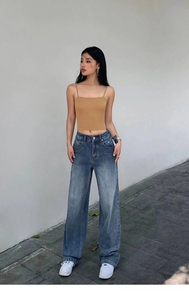Washed blue high-waist loose denim jeans designed for casual, Y2K, and urban streetwear looks