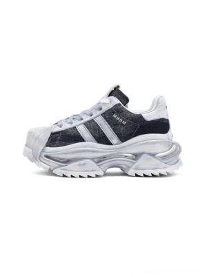 Washed blue leather platform court sneakers with layered side stripes and a chunky retro streetwear sole, side view