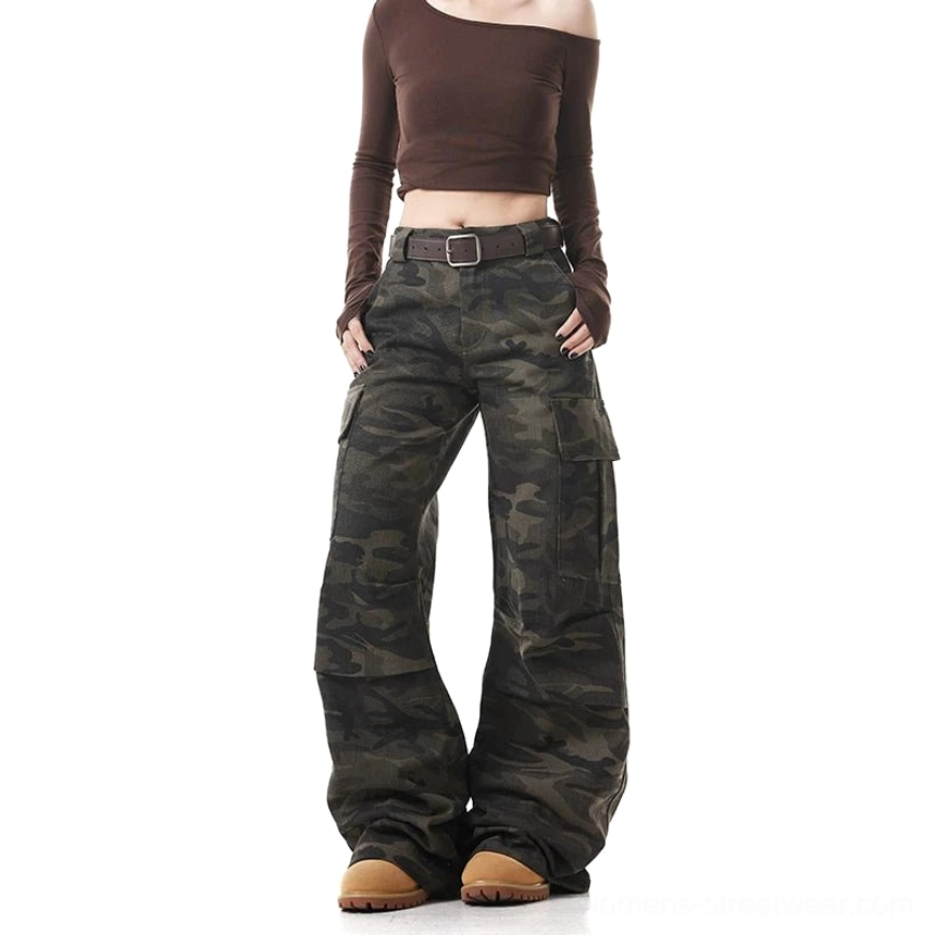 Full length washed camo straight wide leg cargo pants styled with brown crop top belt and tan work boots