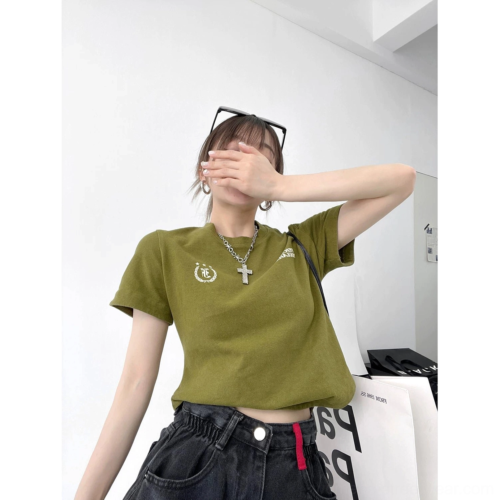 Green washed collegiate logo curved hem streetwear t-shirt color option product view