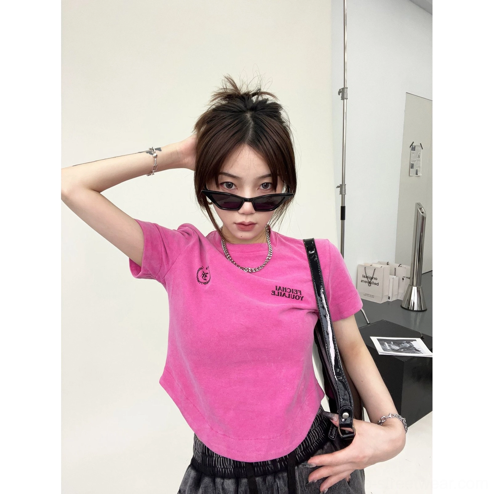 Rose red dragon fruit washed collegiate logo curved hem streetwear t-shirt color view