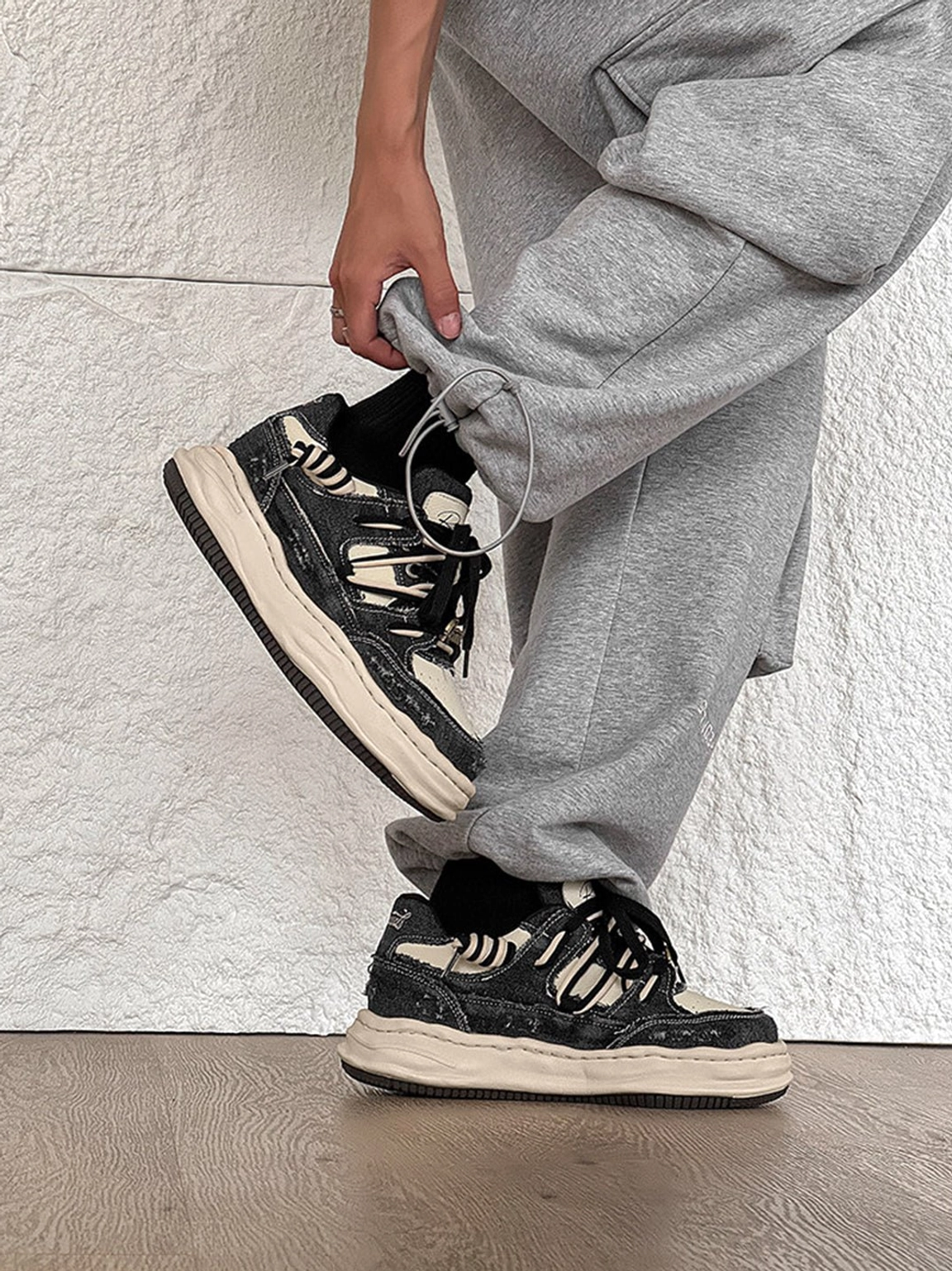 Washed denim-effect chunky sneakers suitable for casual city outfits, oversized layers, and everyday styling