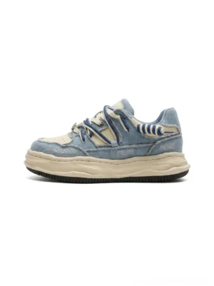 Washed denim dual-lace platform streetwear sneakers in faded blue denim with chunky off-white sculpted sole