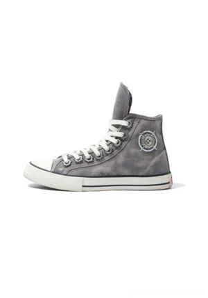 Gray distressed denim high-top sneaker left side profile showing circular side badge black striped rubber sole and worn wash