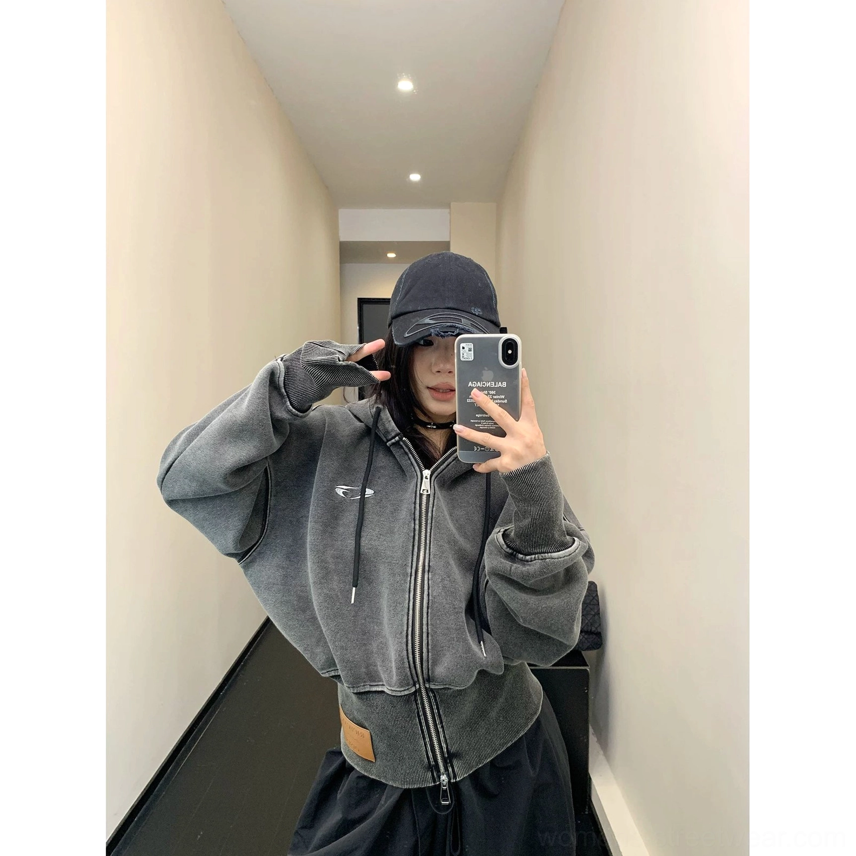Washed oversized cropped zip hoodie in Seoul streetwear style with a relaxed boxy fit, hood, double zipper, and ribbed hem