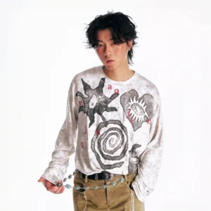 Black washed tribal graphic oversized long sleeve streetwear tee worn with khaki cargo pants
