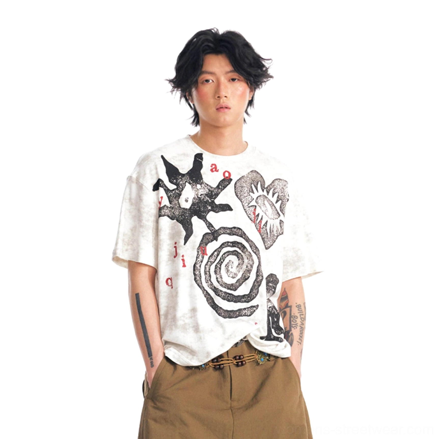 Male model wearing black tribal graphic washed oversized streetwear tee with spiral sun and heart-eye prints