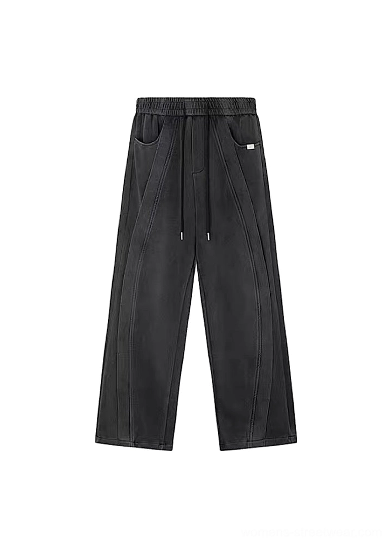 Wide-leg washed streetwear pants with drawstring waist in a modern Korean fashion inspired urban outfit