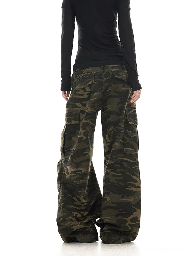 Back view of women’s washed woodland camouflage wide leg cargo pants showing waistband and pocket details