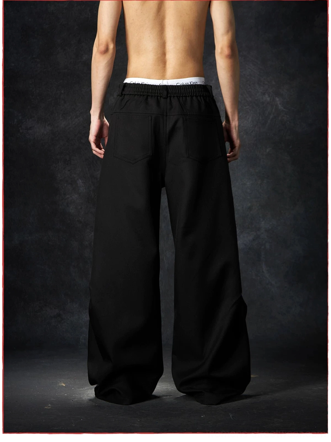 Wave contour wide-leg streetwear trousers product detail image highlighting the sculptural silhouette and oversized leg construction