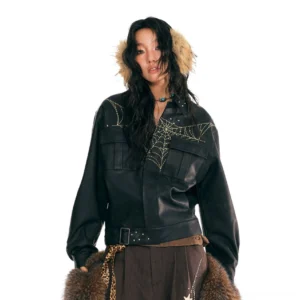 Black web embroidered faux leather moto jacket front view with spiderweb chest embroidery and flap pockets
