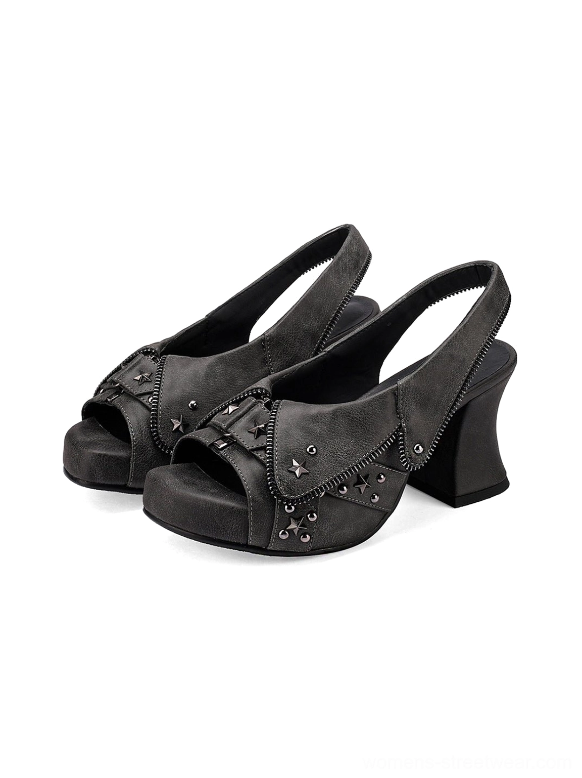 Front angled view of western-inspired denim peep-toe slingback heels with studded upper and block heel