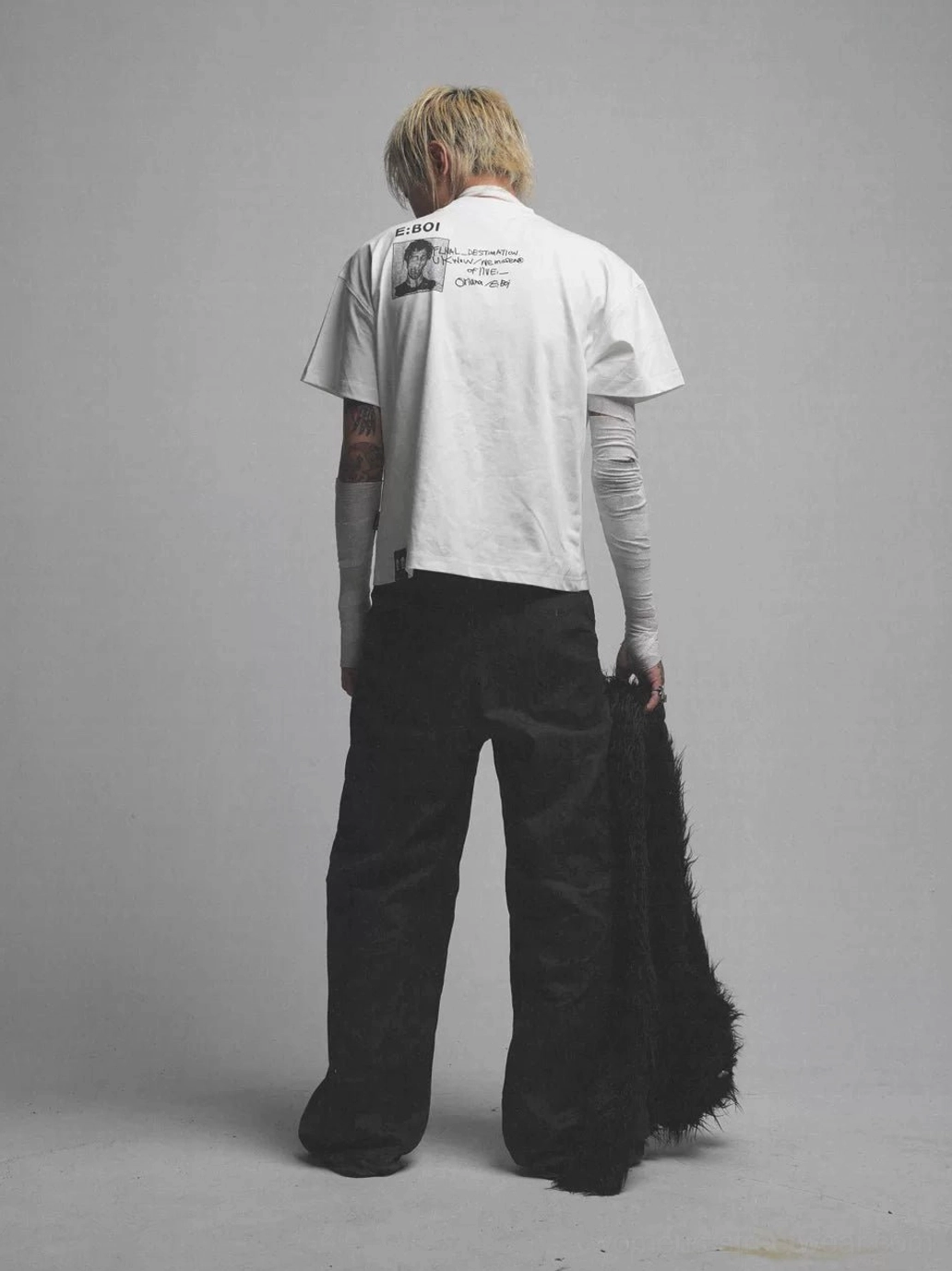 Whatever Guitarist oversized graphic tee detailed view showing punk inspired cotton streetwear construction