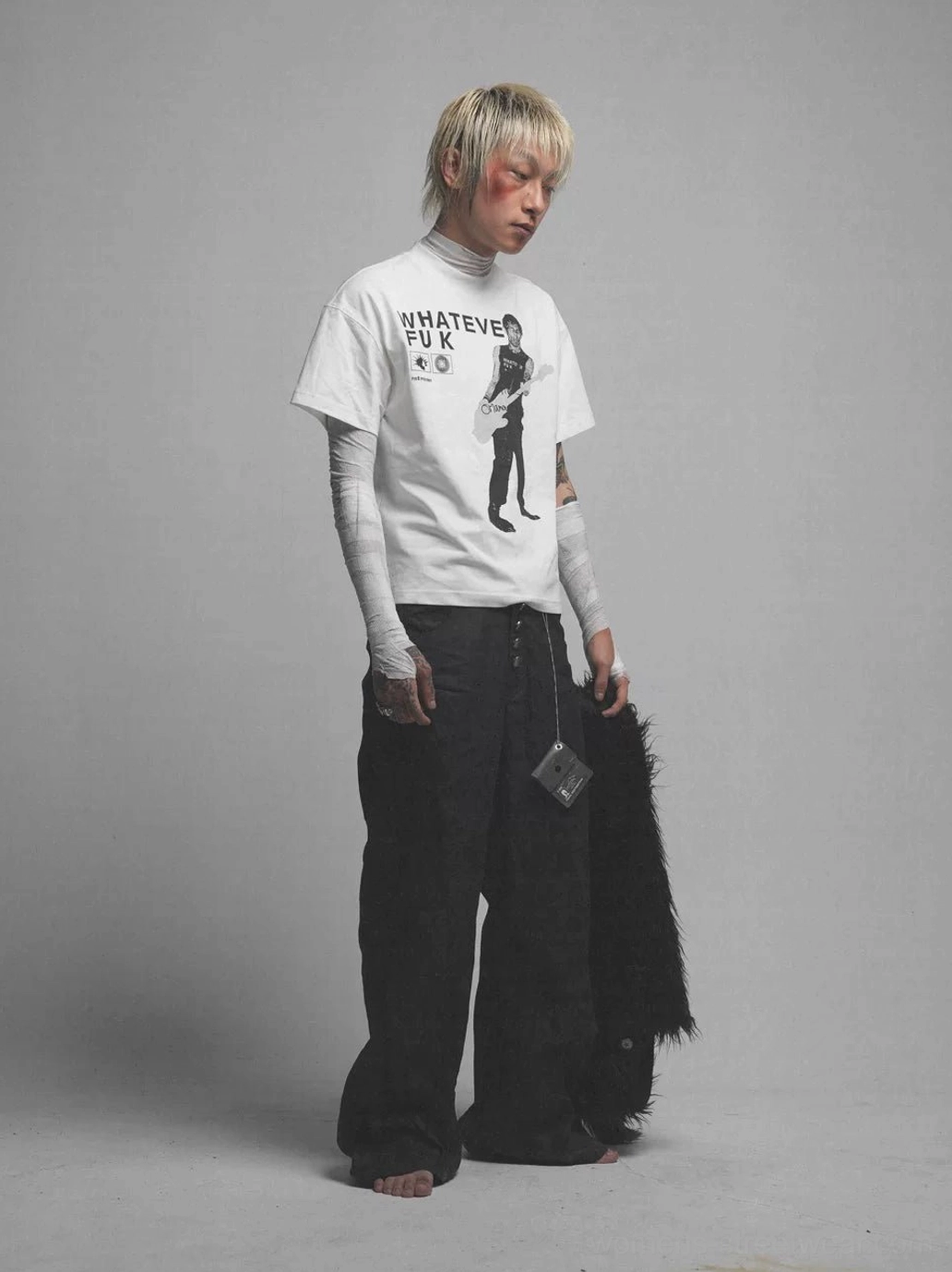 White Whatever Guitarist oversized graphic tee with black guitarist print styled in Korean streetwear fashion