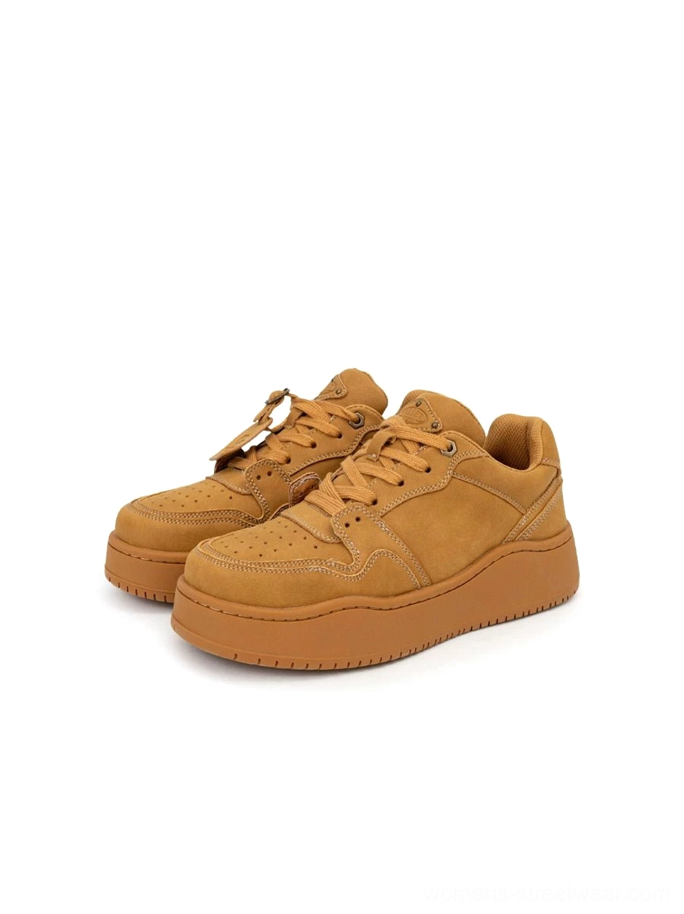 Top view of pair of wheat yellow retro platform skate sneakers featuring tonal nubuck-style uppers, perforated toe caps and wide laces