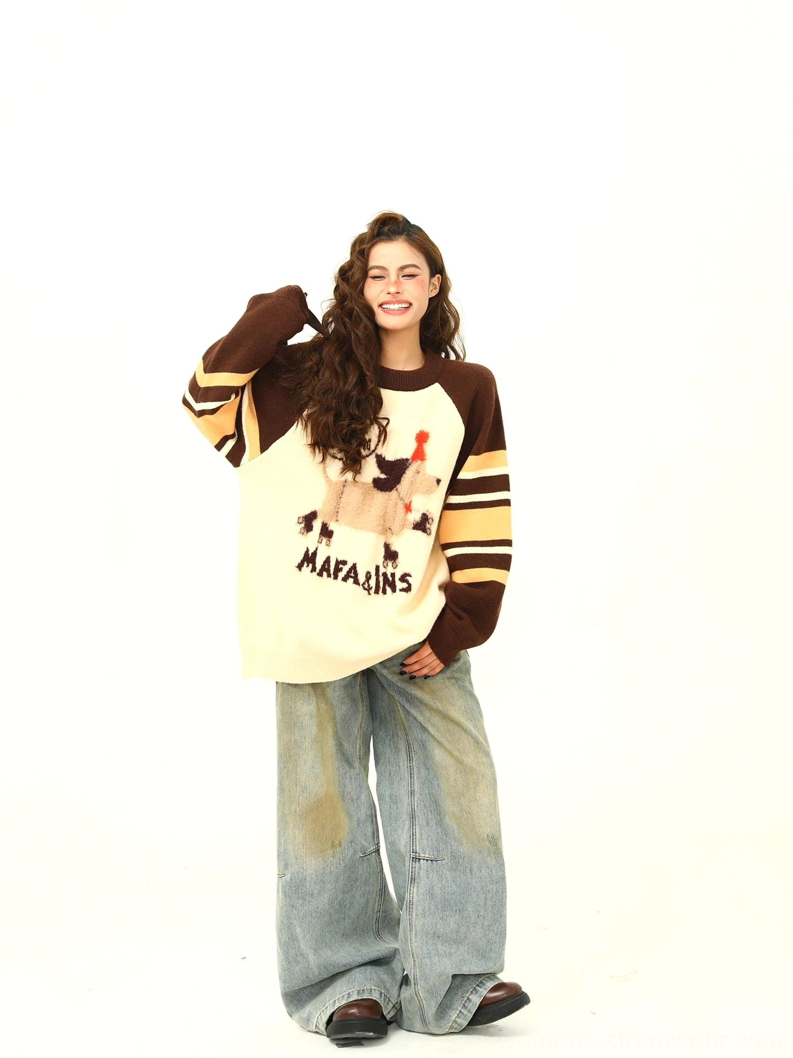 Three-quarter view of a whimsical dachshund graphic pullover with fuzzy animal artwork and brown yellow color-block sleeves