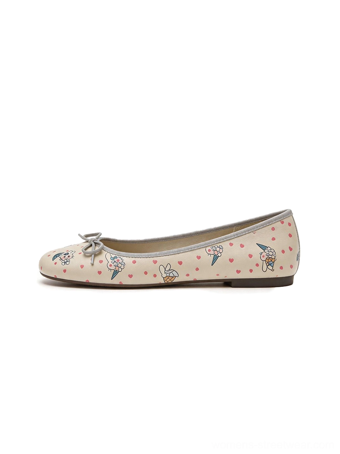 Side profile of whimsical rabbit illustrated ribbon square-toe ballet flats with an off-white printed upper and shallow slip-on silhouette