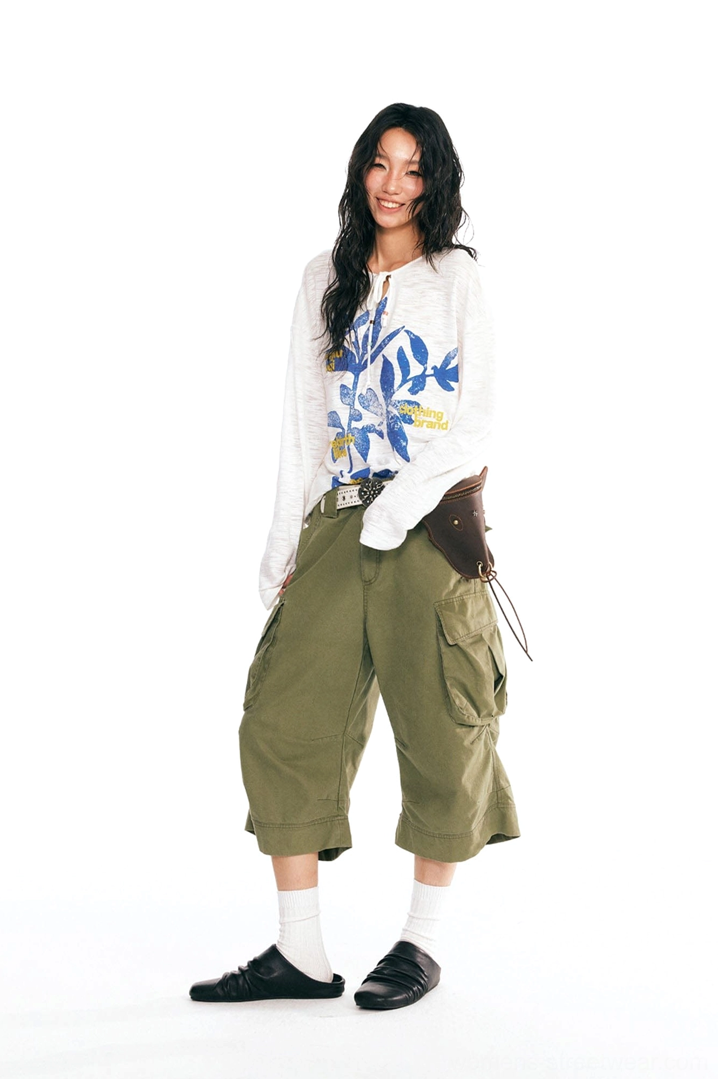 White Acubi graphic long-sleeve tee with blue sesame leaf print shown in a three-quarter streetwear outfit