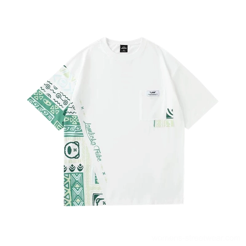 White asymmetric tribal panel oversized heavyweight cotton T-shirt flat lay showing green patterned sleeve and side panel
