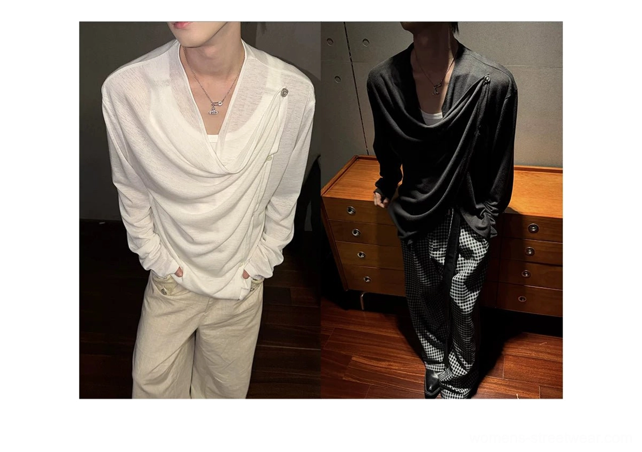 White and black asymmetric draped button tops displayed in contemporary Korean streetwear outfits with wide-leg trousers