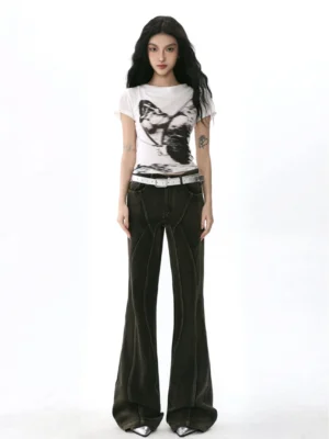 Women's white butterfly graphic cropped T-shirt styled with dark flared jeans and a silver belt in a Korean streetwear outfit