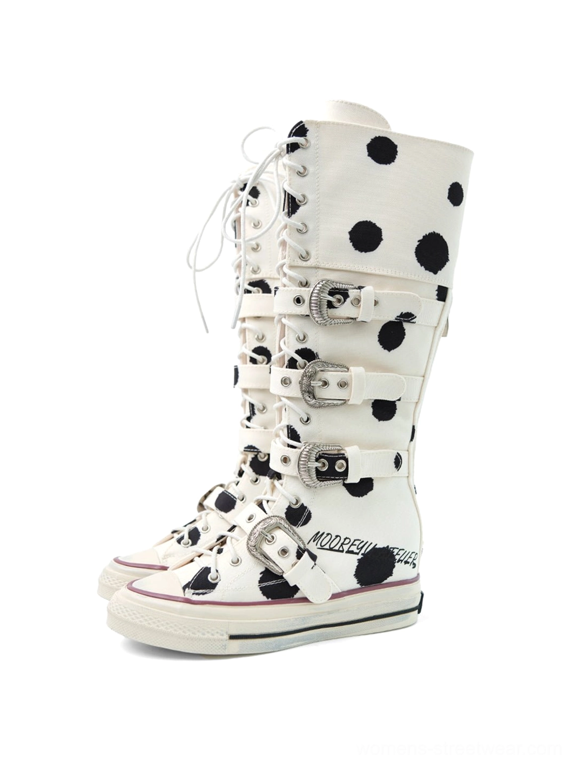White black polka dot lace-up combat boots with mid-calf silhouette and decorative buckle straps for Y2K streetwear