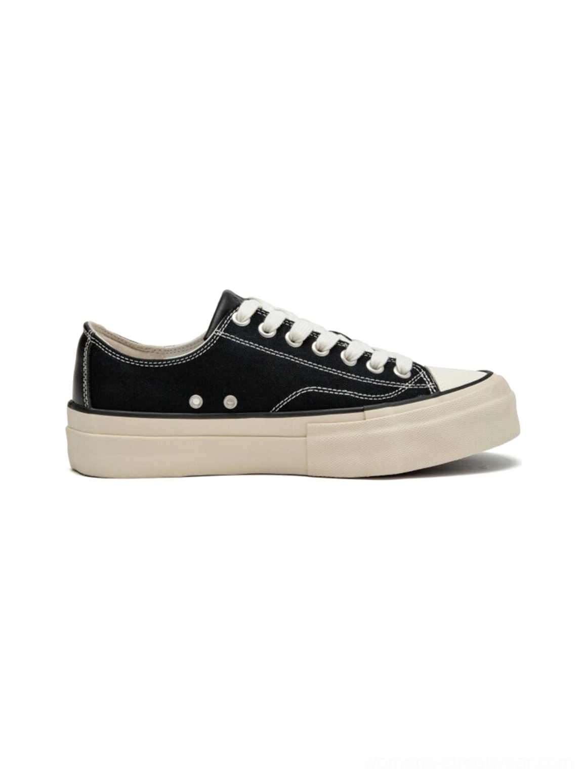 White canvas platform sneaker with cork midsole, low-top unisex streetwear silhouette, flat product display side perspective
