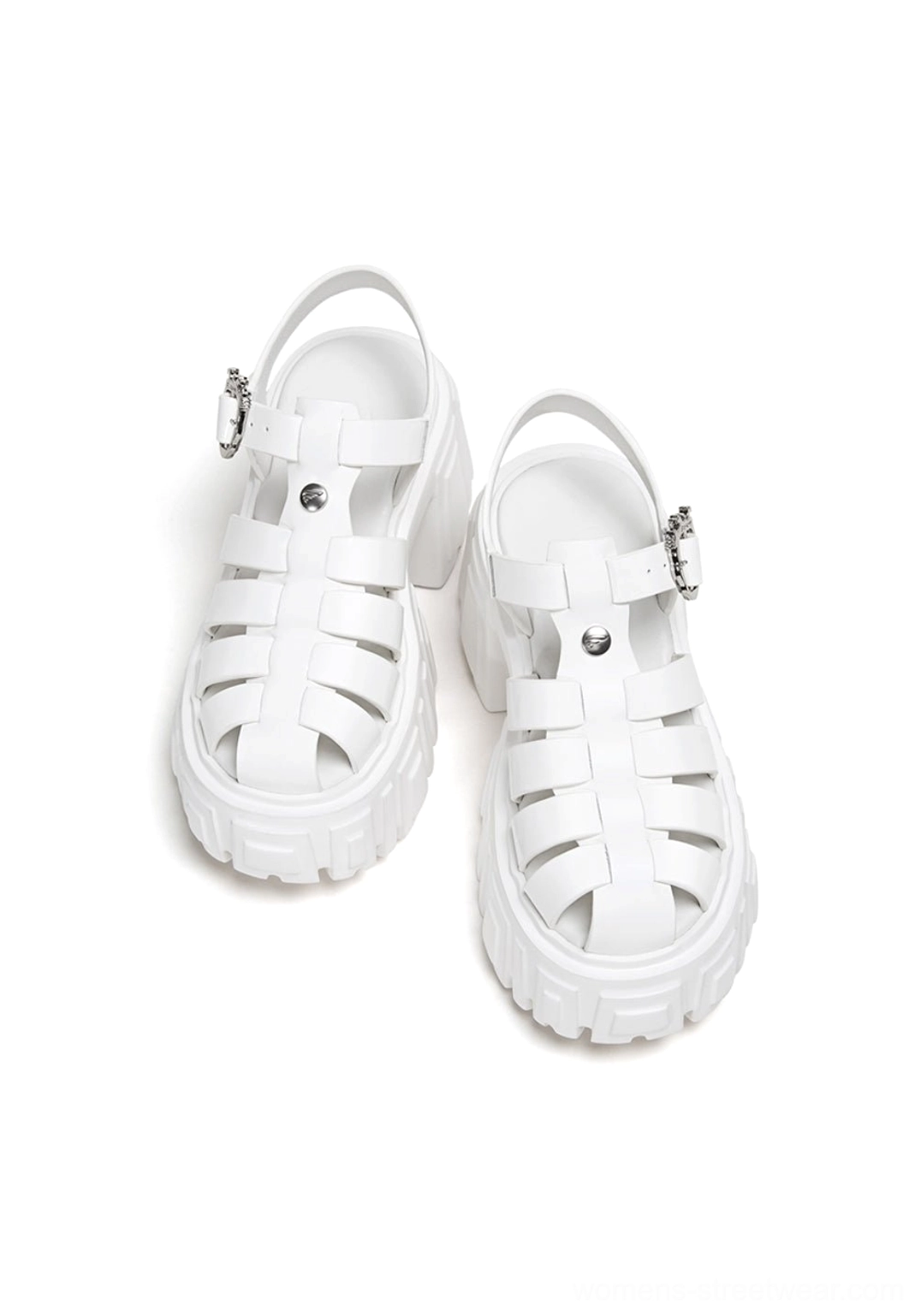 Front view of matching white chunky Roman platform sandals with caged straps, heart-shaped buckles, and lugged soles