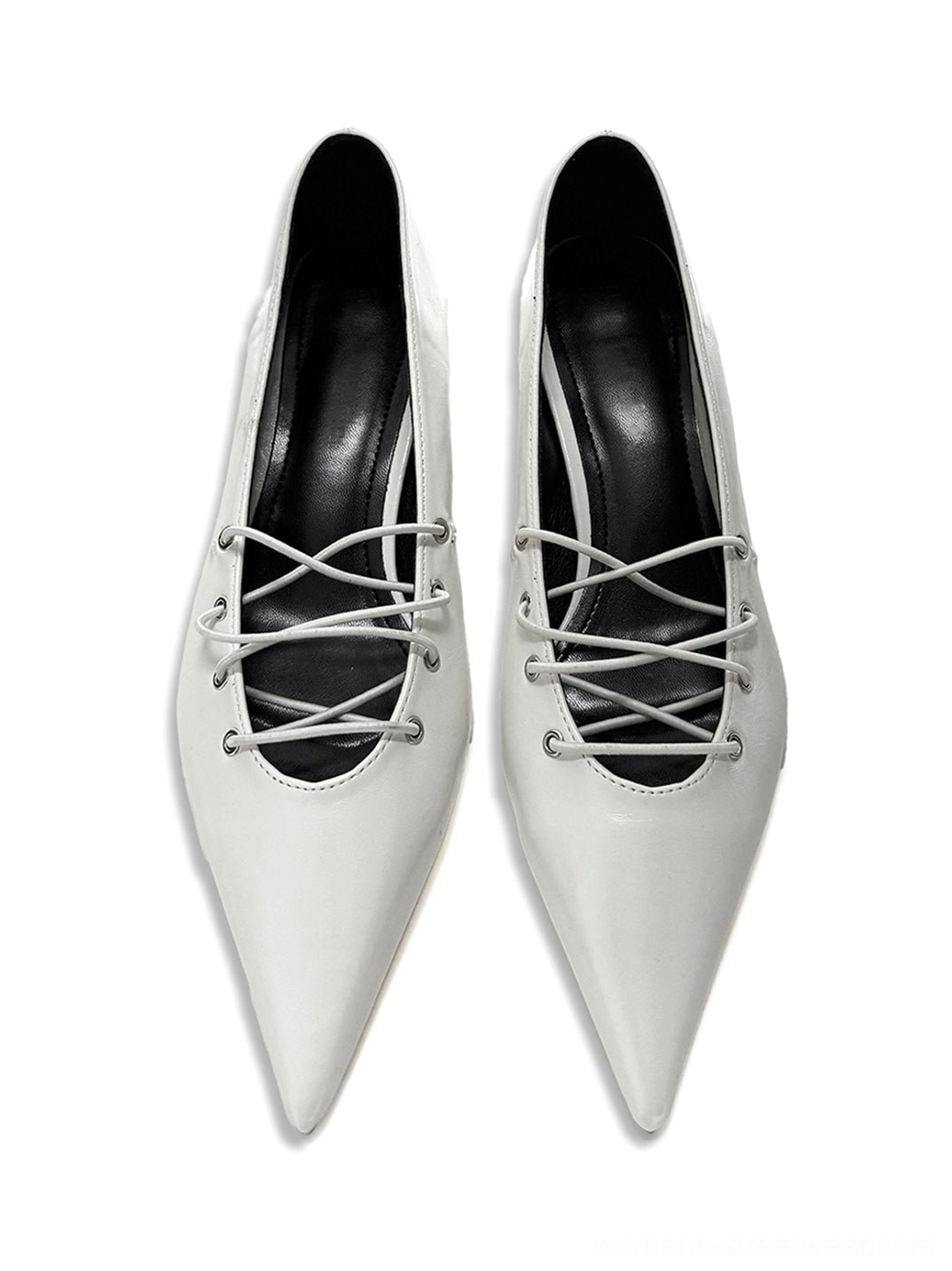 Pair of white corset-lace pointed ballet flats shown from the front with matching crisscross laces, sharp toes, black lining, and clean monochrome finish