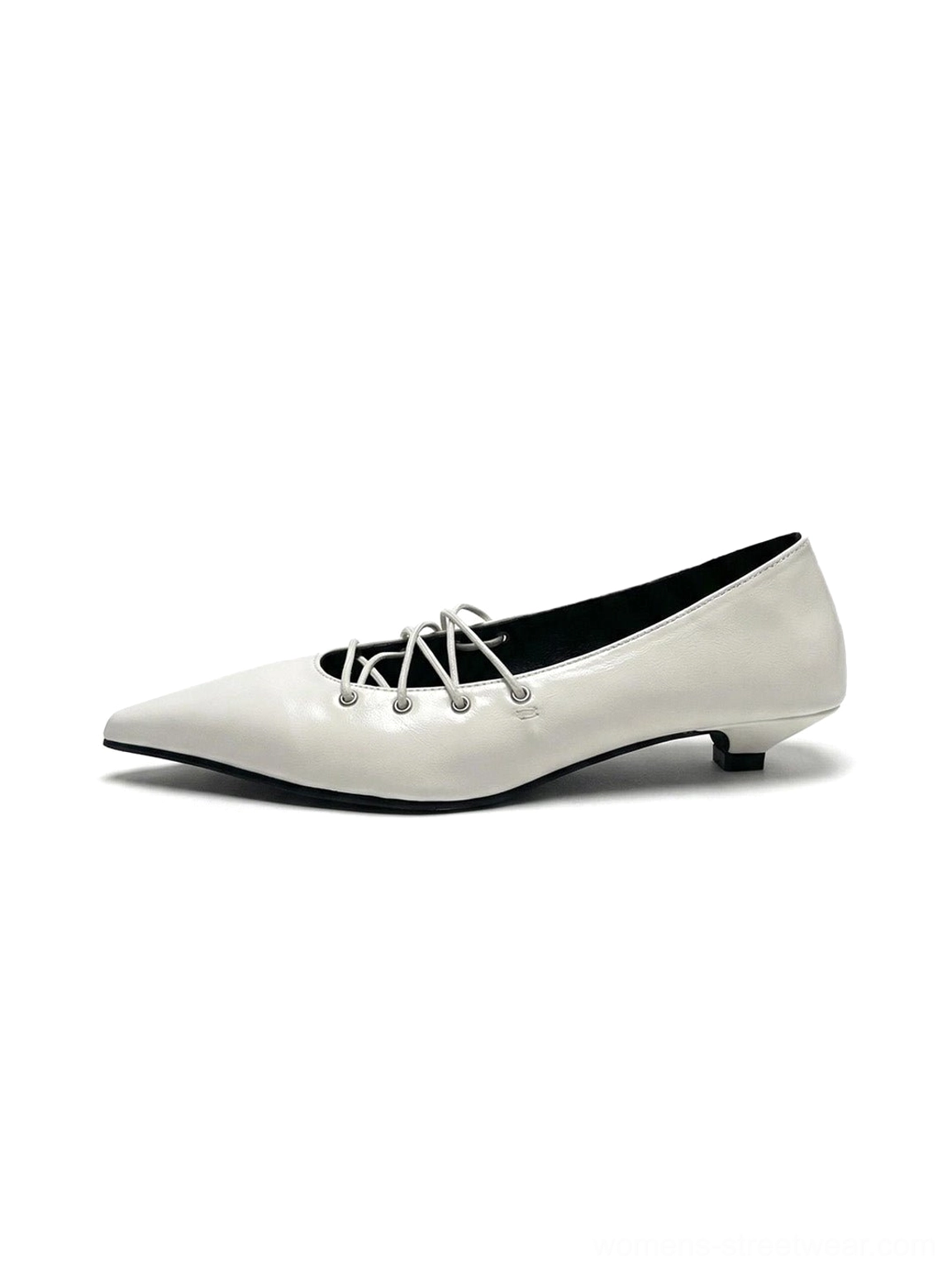 White corset-lace pointed ballet flats with glossy leather-look upper, slim low heel, sharp toe, and crisscross instep lacing shown in side profile