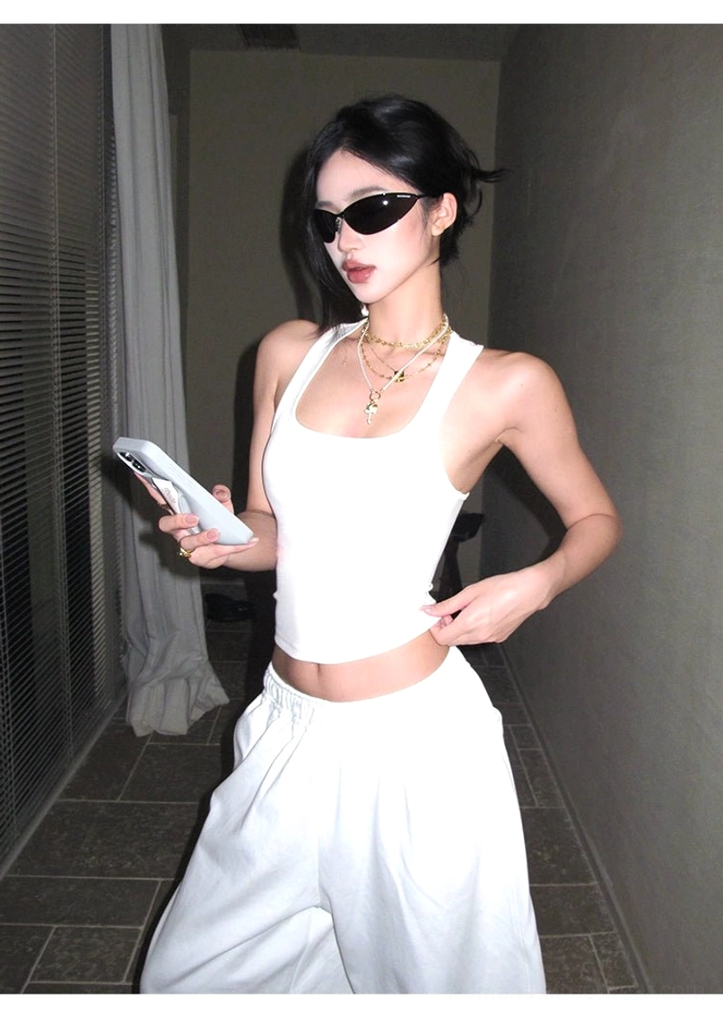 White cotton wide-leg streetwear pants product image with clean minimalist proportions and versatile everyday styling
