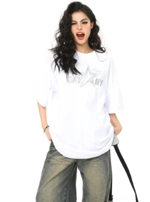 White Day Star NY oversized graphic tee on female model with silver star chest print, dropped sleeves, and relaxed Korean streetwear fit