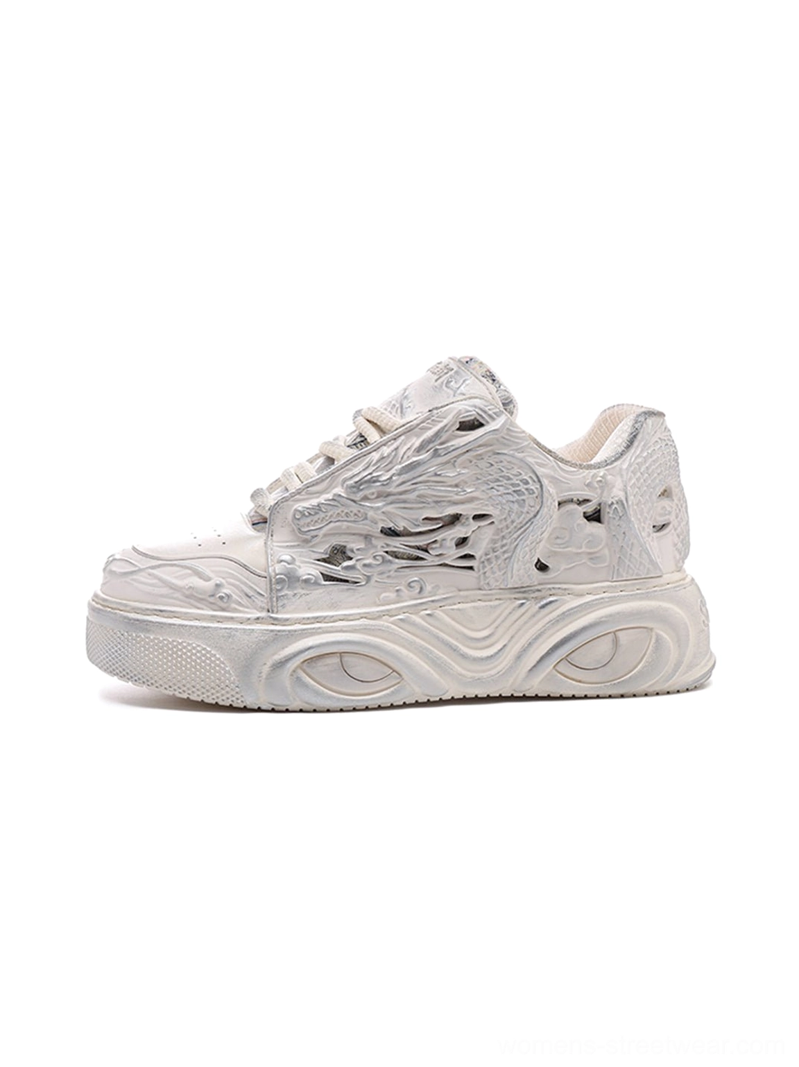 White dragon relief platform sneakers shown in a left side profile with a 3D carved upper and chunky wavy platform sole