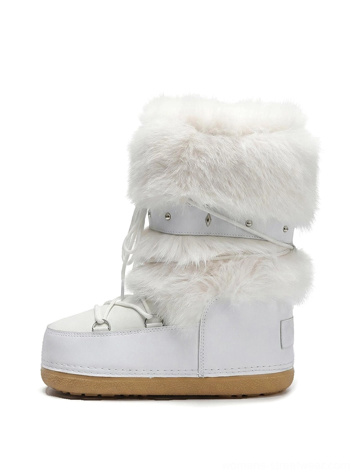 Front view of white faux fur platform snow boots with fluffy cuffs, studded straps, lace-up closure, and chunky gum rubber outsole