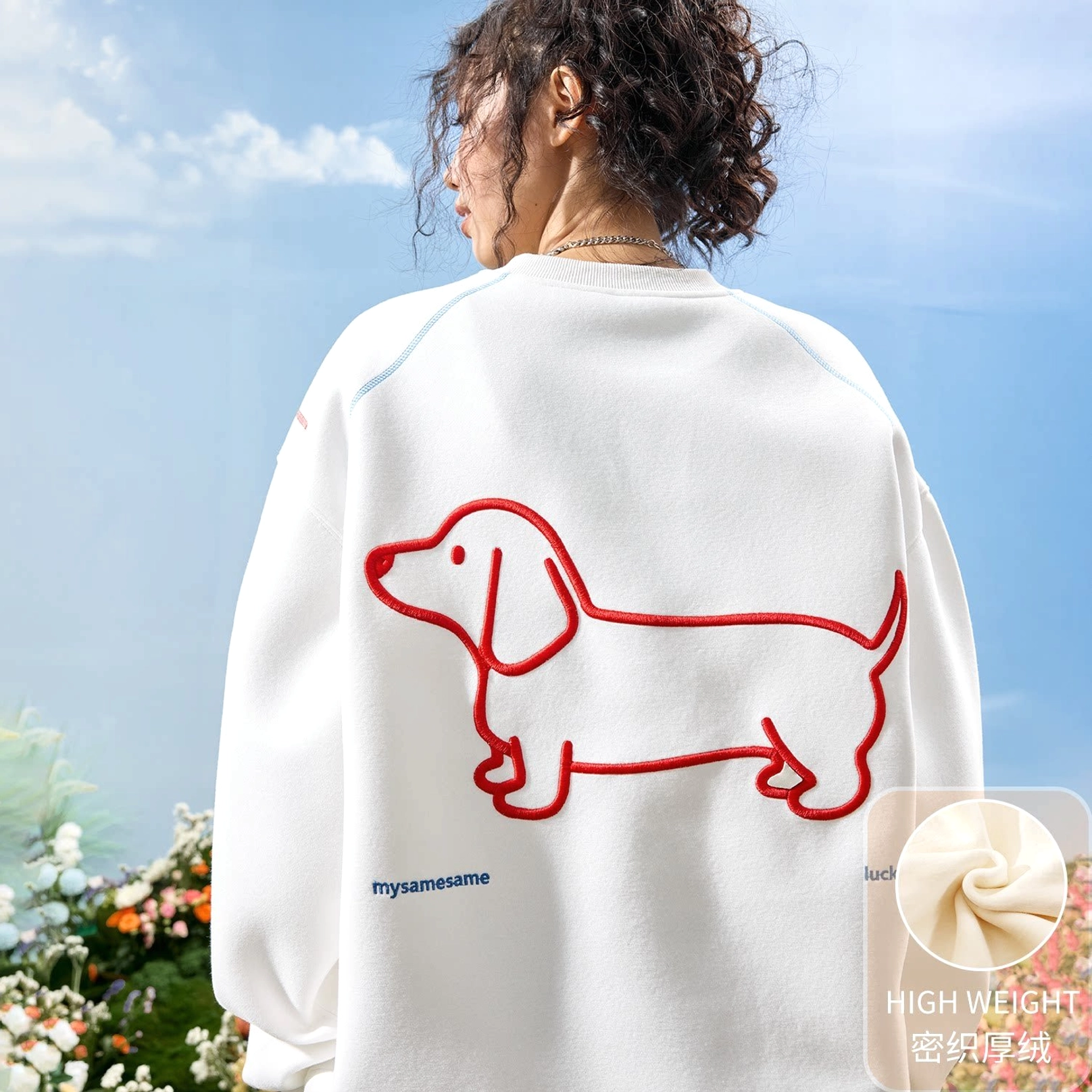 White fleece-lined dachshund embroidered oversized crewneck sweatshirt with red front and back dog artwork