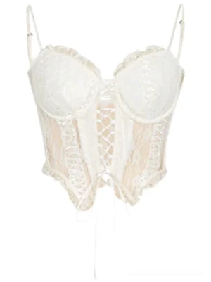 White floral lace-up bustier corset top with underwire cups, spaghetti straps, ruffled trim and pointed hem front flat lay